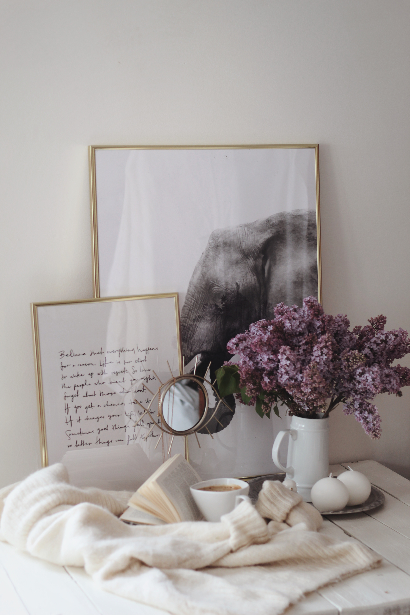 Purple Flowers on White Ceramic Vase